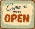 Vintage Rusty Come in We're open Metal Sign. Royalty Free Stock Photo